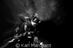 Strange things happen to divers in dark caves..... by Karl Marchant 